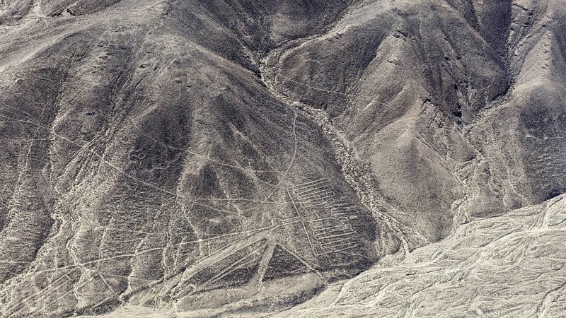 Rocky hills in a desert-like area with incised lines, the geoglyphs and drawings in the desert near Nasca and Palpa in Peru