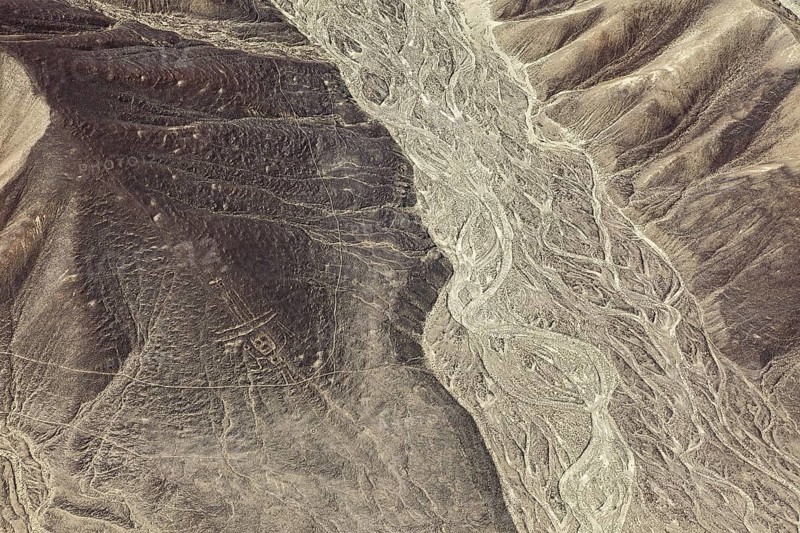 Ancient lines and patterns in a dry desert landscape, the geoglyphs and drawings in the desert near Nasca and Palpa in Peru