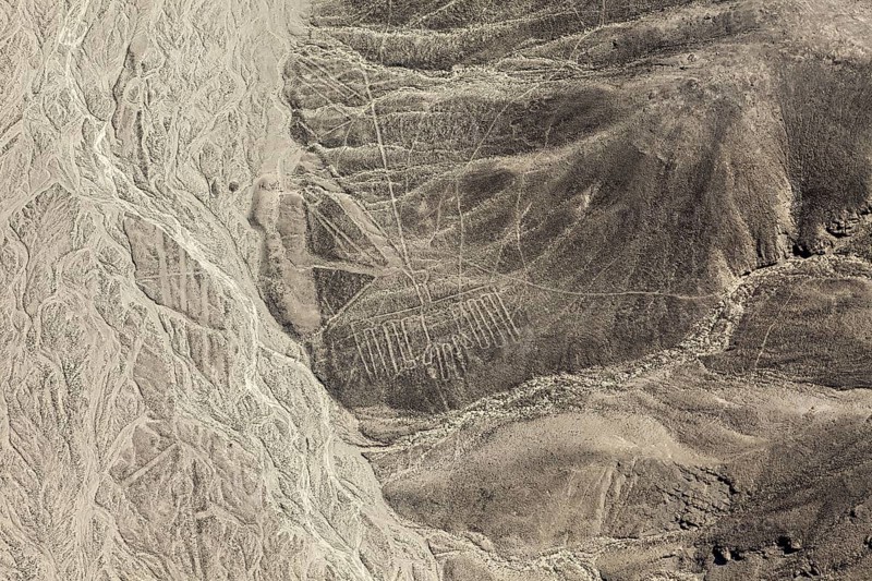 Aerial view of line patterns that run through the inhospitable desert landscape, the geoglyphs and images in the desert near Nasca and Palpa in Peru