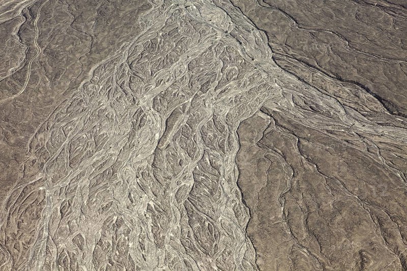 Detailed view of a desert-like landscape created by erosion, The desert landscape near Nasca in Peru