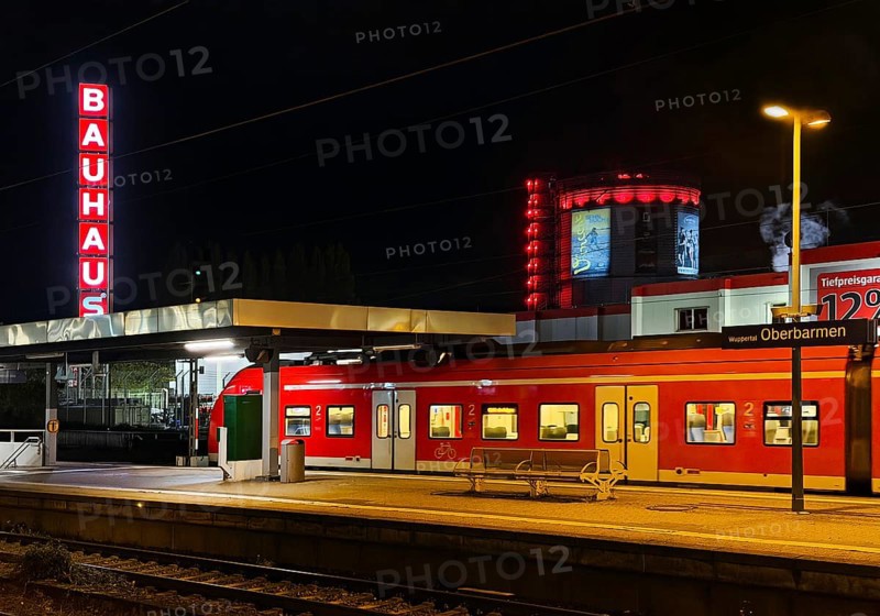 Local train at Oberbamen station with gas boiler at night, Wuppertal, North-Rhine Westphalia, Germany