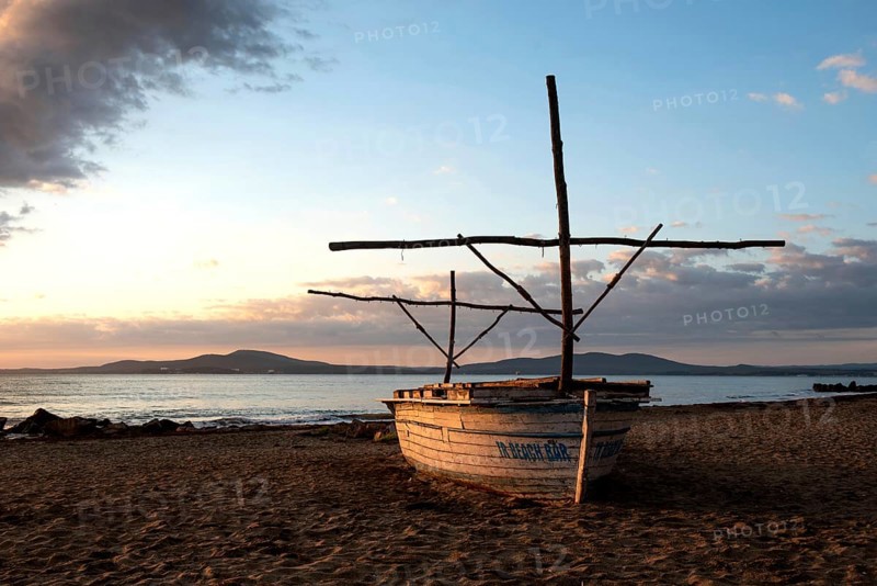 Burgas, Bulgaria, September 25th 2020 Empty beach at sunrise beside the pier in Burgas on the Black Sea coast of Bulgaria