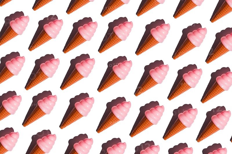 Pink plastic ice cream cones arranged in a pattern represent the critique of junk food and plastic diet culture This image explores the artificial appeal of unhealthy diets