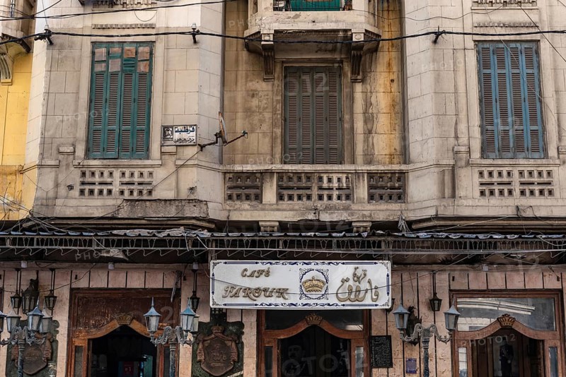 Alexandria, Egypt. December 3rd 2022. Faded traditional architecture of the famous Cafe Farouk, typical Egyptian coffee house nr the Corniche sea front of Alexandria, Egypt
