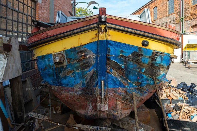 Old barge at a shipyard, Italy