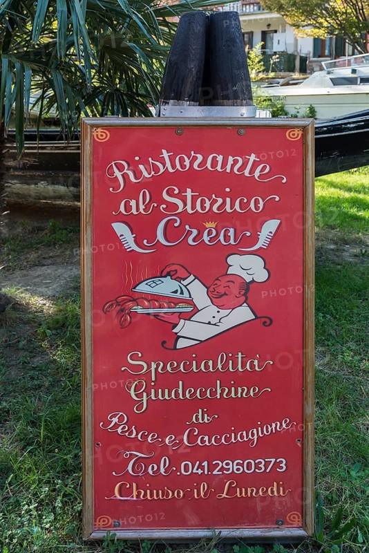 Advertising sign for a restaurant on the island of Giudecca, Venice, Veneto, Italy