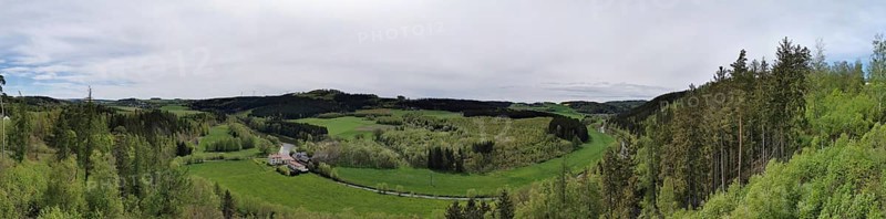 Panorama, far-reaching view over green meadows, fields and wooded hills, hiking on the Rennsteig, Thuringian Forest