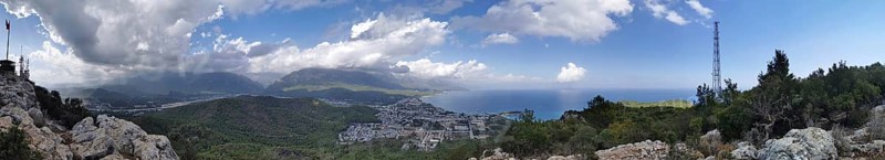 Panoramic view from Calis Tepe in Kemer of a coastal region with mountains, sea and dramatic clouds, Kemer, Turkey