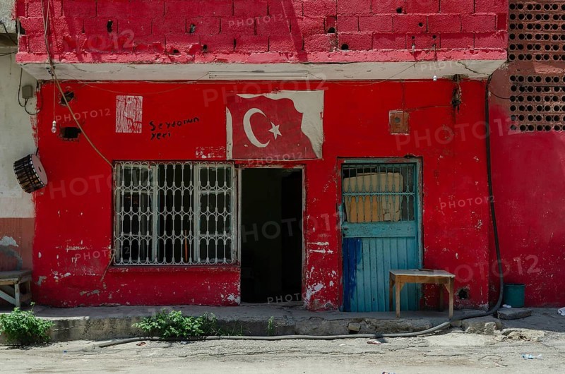 Adana, Turkey. 8th June 2014 Red painted workshop building in the Anatolian city of Adana, Turkey