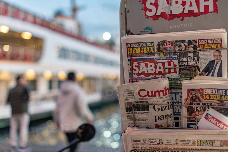 Istanbul, Turkey. January 8th 2025. Turkish daily newspapers displayed on a stand at Karakoy Ferry Station on the European side of Istanbul, Turkey