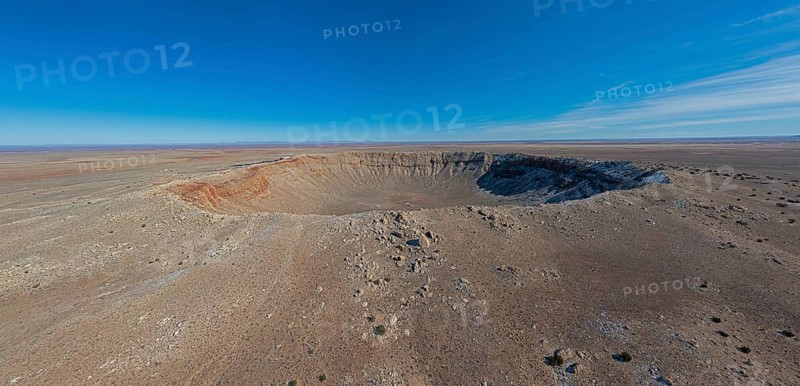 Winslow, Arizona - Meteor Crater. The crater was formed about 50, 000 years ago. It is 560 feet deep and abouat three-quarters of a mile in diameter. It is now a major tourist attraction
