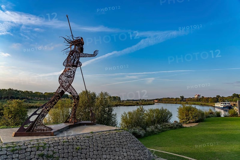 Peaceful Warrior sculpture Vreedzame Krijger on the Maas in Venlo, the Netherlands
