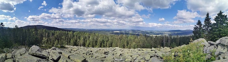 Panorma taken from Mount Platte, far-reaching view of a wooded landscape with rocks under a blue sky, Platte, Franconian mountain trail, hiking in the Fichtelgebirge nature park Park