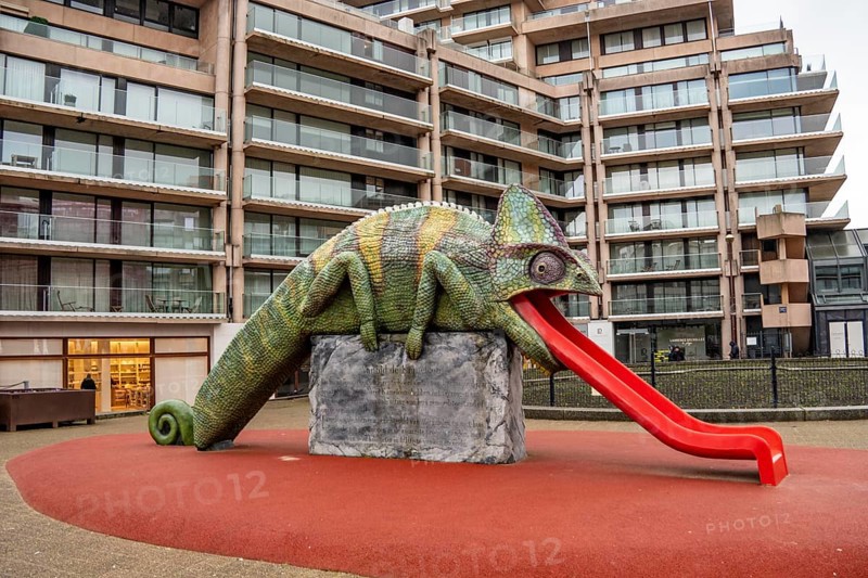 Art in Knokke-Heist, chameleon, tongue as a slide, by Jeremy Deller, part of the Beaufort Triennial, many permanent works of art in public spaces are spread around the city, dreary winter day, Belgium