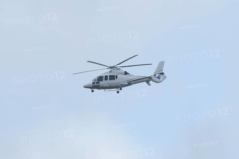 Eurocopter EC-155B-1 Dauphin 2 Airbus Helicopters H155 Helicopter A7-HMD in flight, England, United Kingdom