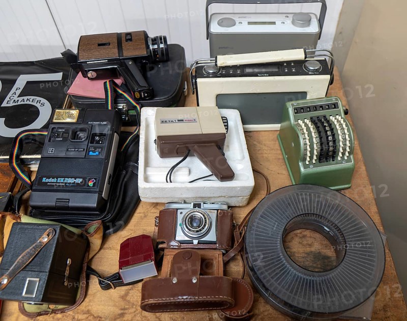 Display of film cameras, cine camera, transistor radios and other types of old analogue technology, UK