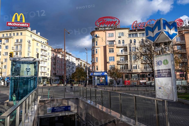 Sofia, Bulgaria. November 22nd 2025. Entrance to NDK metro at the at the junction of Vitosha Boularvard with brand signs for McDonalds, Happy and Coca-Cola, Sofia, Bulgaria