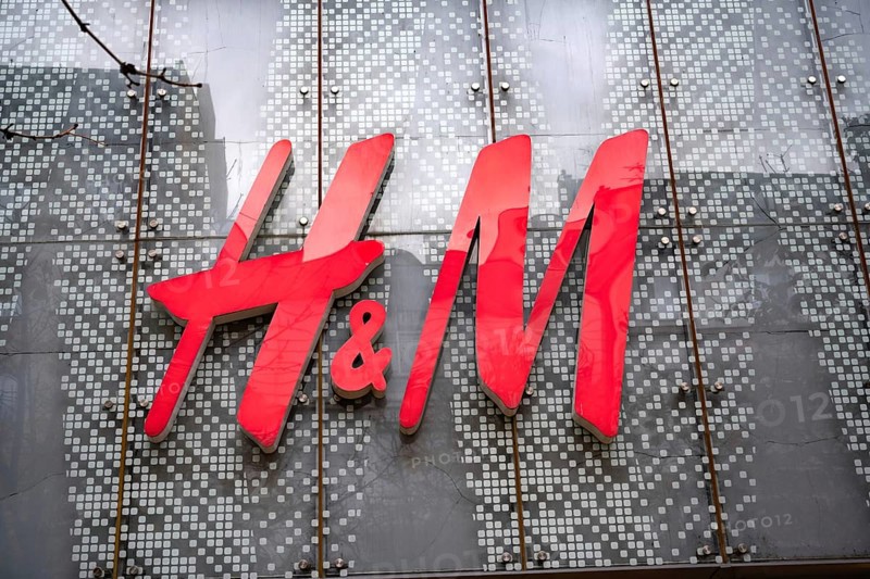Sofia, Bulgaria. November 22nd 2025. Logo for H & M Hennes & Mauritz AB, known by its brand name H&M, a Swedish multinational fast fashion retailer, displayed on a store in Sofia, Bulgaria