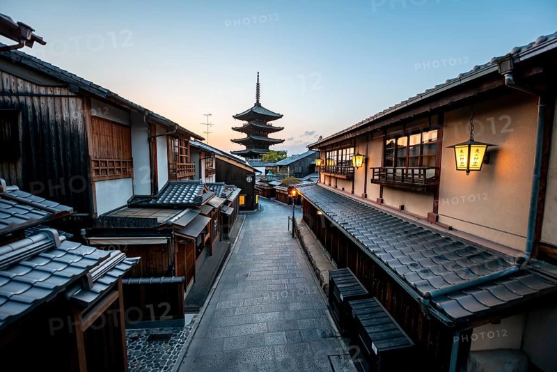 Yasaka dori historic street in the old town with traditional Japanese houses, five-story Yasaka Pagoda of the Buddhist Hokanji Temple at the back, evening mood, blue hour, Higashiyama, Kyoto, Japan
