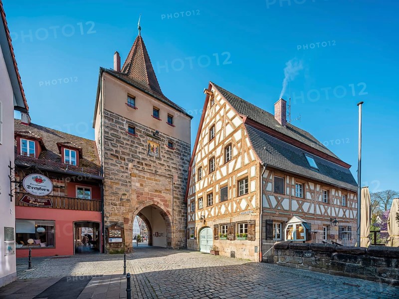 The Hersbrucker Tor and a half-timbered house in Lauf an der Pegnitz, Middle Franconia, Bavaria, Germany