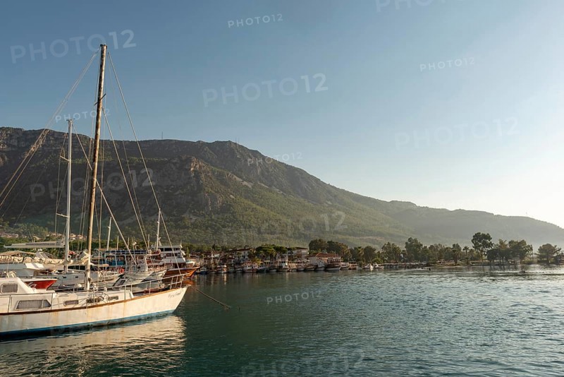 Akyaka, Mugla, Turkey. September 8th 2022 Boats moored in the beautiful harbour at the entrance to the Azmak River, at the Turkish Riviera seaside town of Akyaka on the south west coast of Turkey