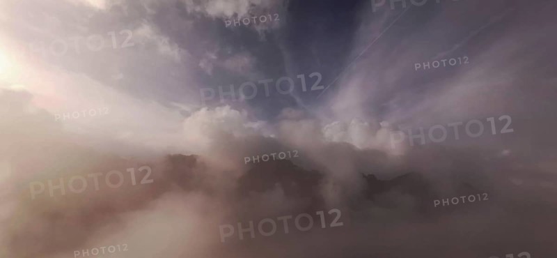 Gentle fog and cloud formations over a mountain landscape at dusk, hiking in the High Tatras National Park, Carpathian Mountains, Poland