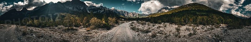 Dramatic panorama of a mountain landscape with contrasting lighting, Albanian Alps National Park