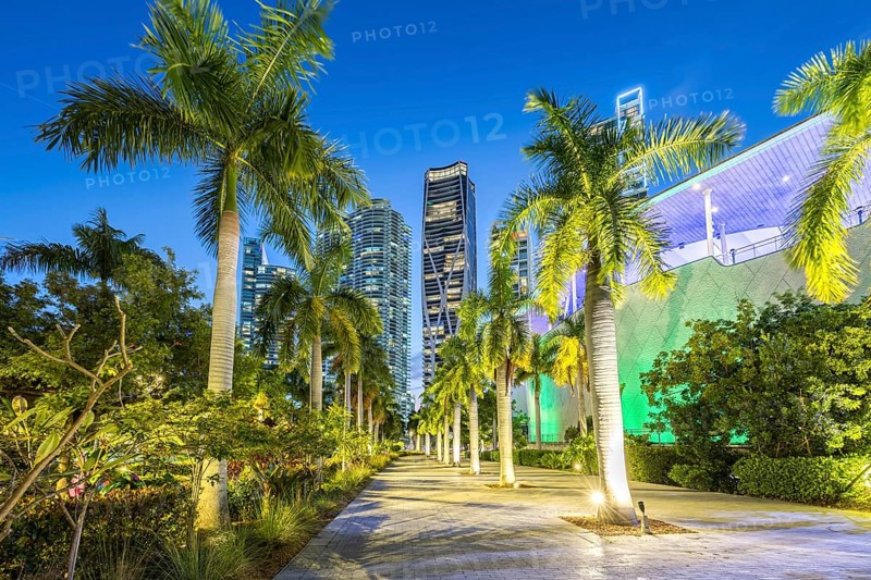Miami skyline with high-rise real estate at night at Maurice A. Ferre Park in Miami, USA