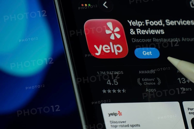 Dhaka, Bangladesh- 24 Oct 2025: A iPad screen displaying the Yelp app on App store