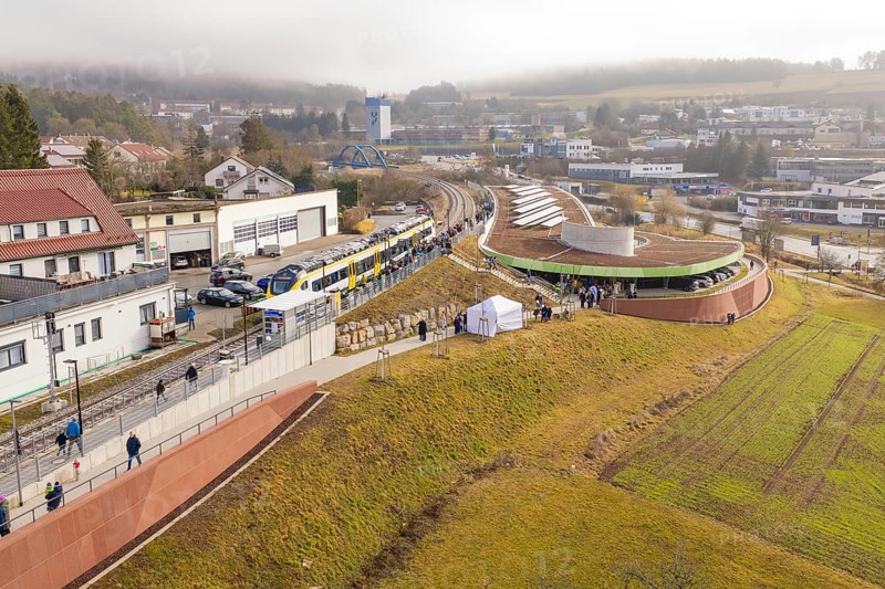 Panoramic view of a train with people in a hilly district during an event, opening of the Hermann Hesse Railway, Calw, Germany