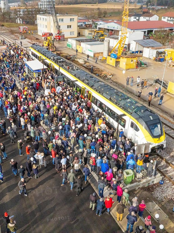 Assembly of people at a construction site event with a train, opening of the Hermann Hesse Railway, Calw, Germany