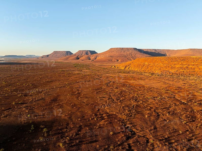 Aerial view, arid desert landscape, hills in Damaraland, Namibia