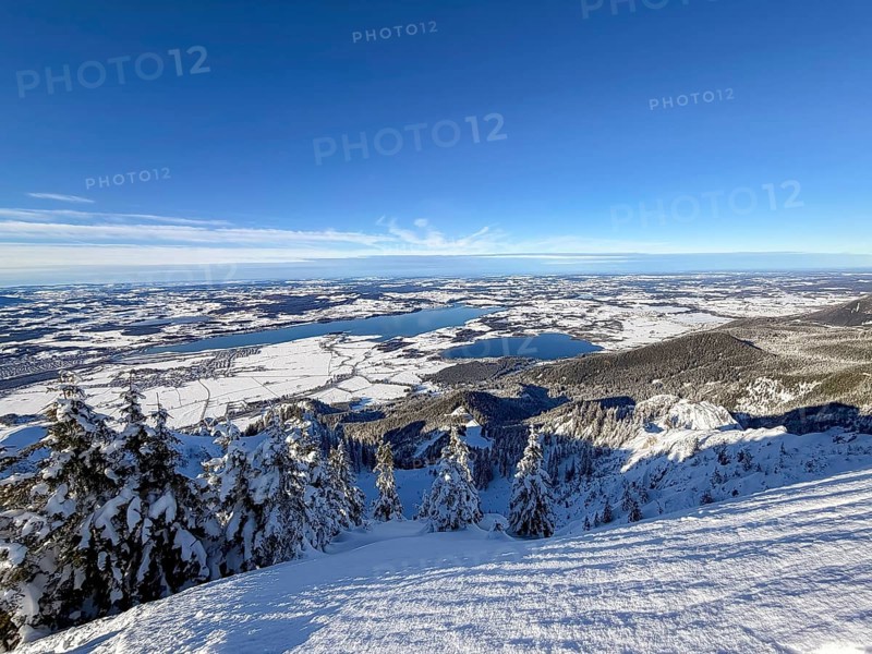 View of Forggensee and Bannwaldsee with snow in winter, ski tour on Tegelberg in winter, Schwangau, Allgäu Alps, Bavaria, Germany