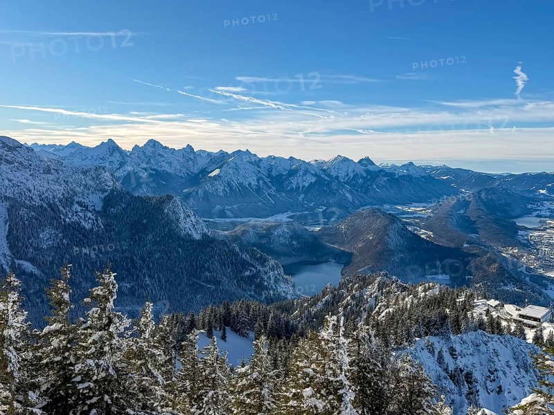 View of snowy mountain landscape of the Allgäu Alps with Alpsee, Tegelberg in winter, Schwangau, Allgäu Alps, Bavaria, Germany