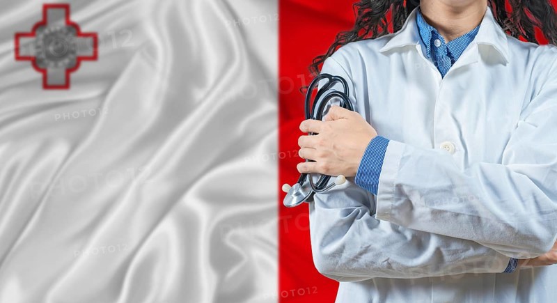 Healthcare professional with Malta flag background. Professional doctor holding stethoscope on Malta flag background