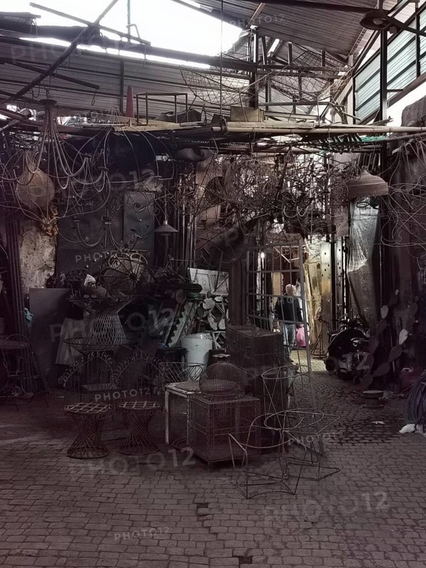 Complex network of cables and metal objects in a workshop in Medina, Morocco