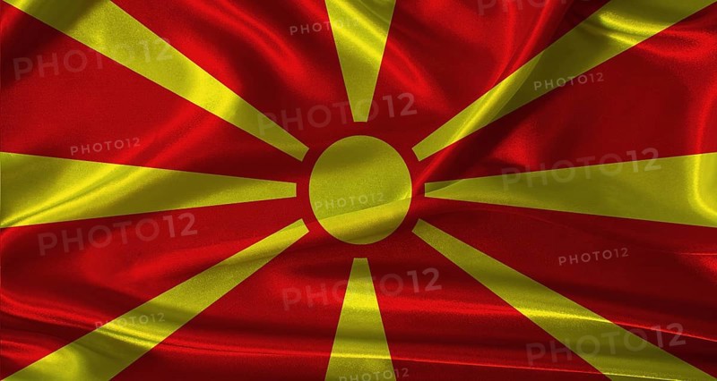 National flag of North Macedonia with cloth texture. North Macedonia flag with realistic texture background