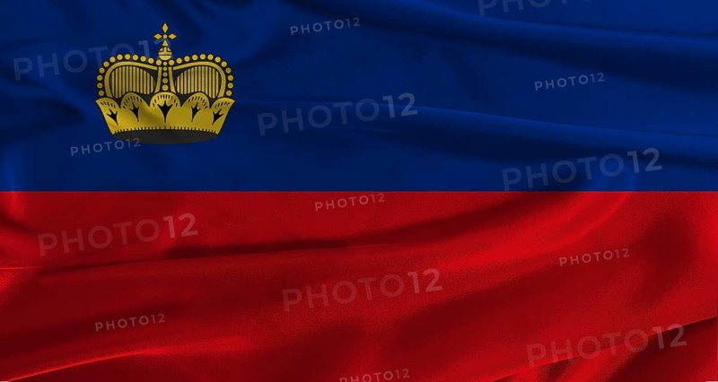 Flag of Liechtenstein with fabric textured background. Close up of National flag of Liechtenstein with realistic texture