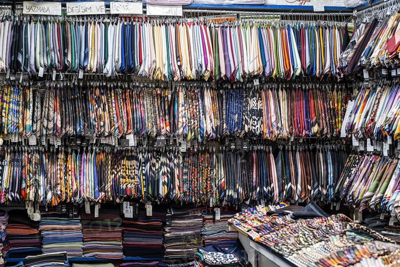 Shelves full of colorful, diverse fabrics in a busy shop, headscarves, Konya, Central Anatolia, Turkey