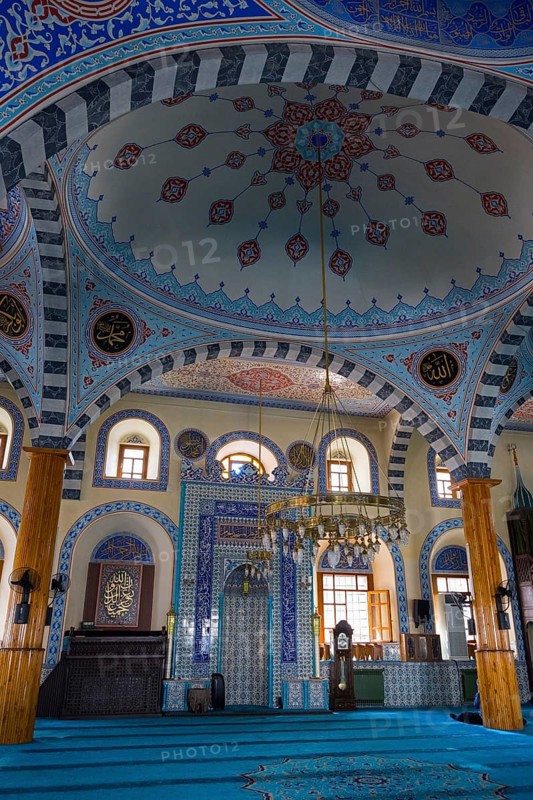 Traditional mosque interior with blue dome and ornate ornaments, spiritual atmosphere, Kapu Mosque, Ottoman era mosque, Konya, Central Anatolia, Turkey