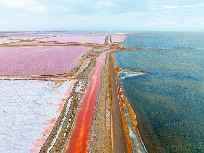 Aerial view of colorful dry pools with salt, saline near Walvis Bay, Namibia