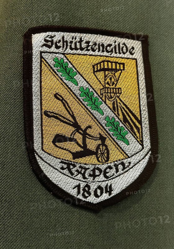 Traditional uniform with badge of the shooting guild Rapen from 1804, detail, House of History, Bonn, Germany