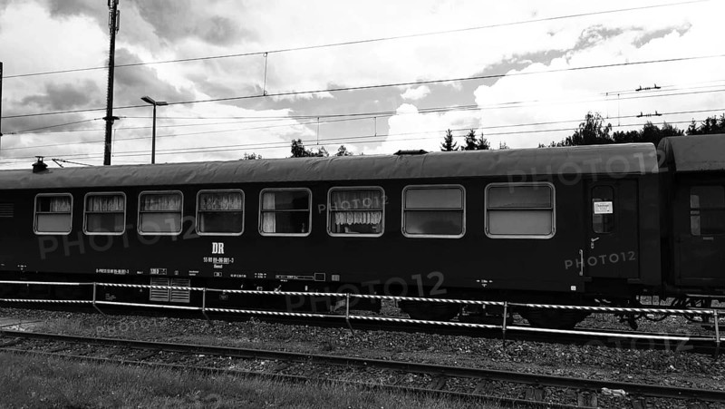 Side view of a historic railroad car on rails with visible windows, nostalgic, Franconian Forest