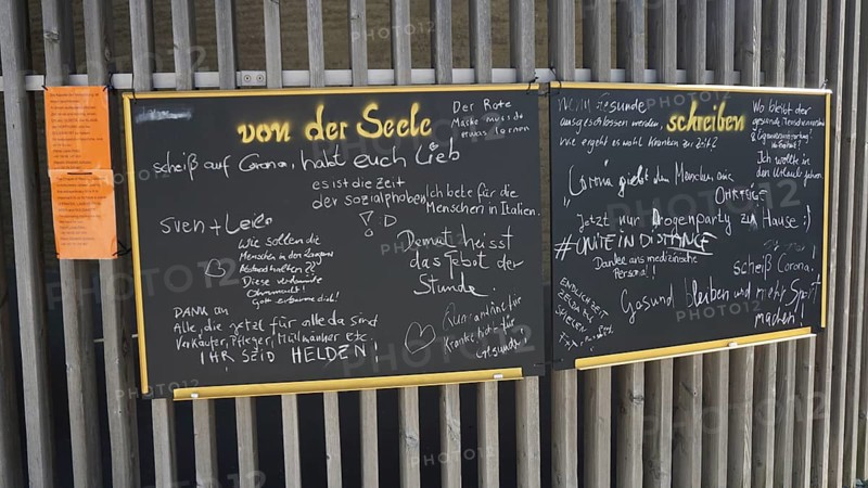 Blackboard written in chalk with various messages and notes during Corona, Berlin