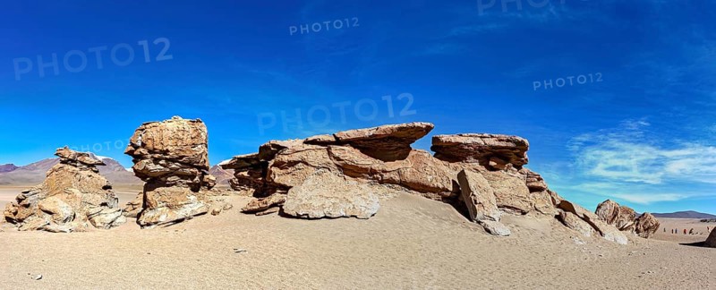 Wide panoramic view of impressive rock formations in the desert under a blue sky, The landscape of the Altiplano in Bolivia