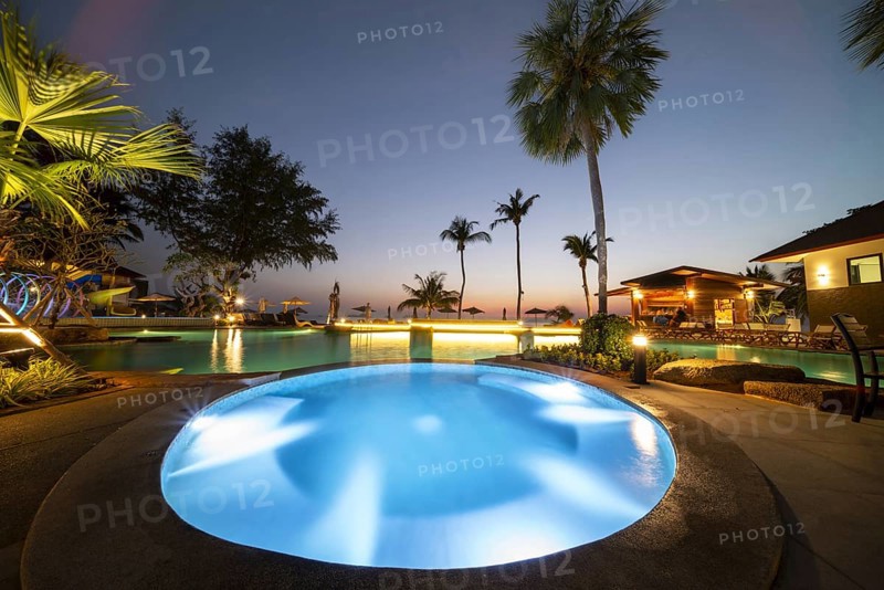 Illuminated swimming pool on Koh Chang Island, Andaman Sea, Southern Thailand, Thailand