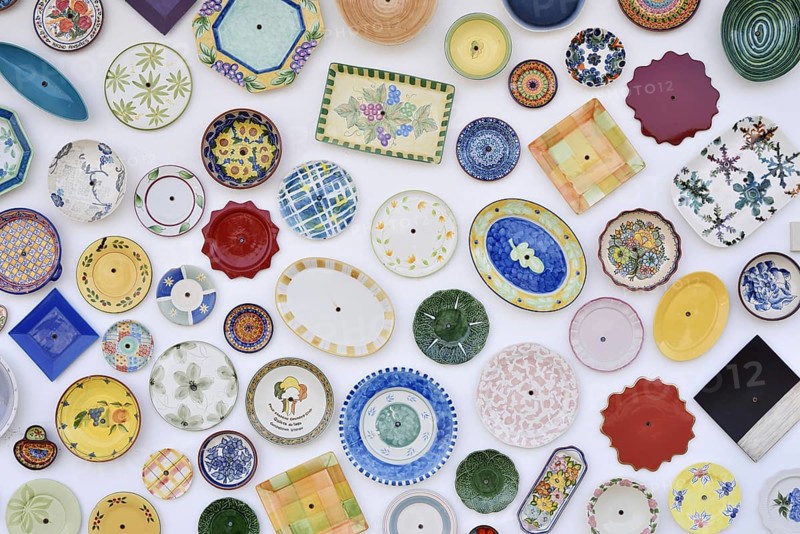House wall with traditionally painted ceramic plates, Vila do Bispo, Algarve, Portugal