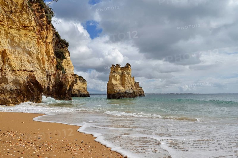 Rocky coast and beach, Praia do Pinhao, Lagos, Algarve, Portugal