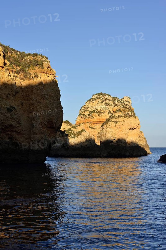 Rocky coast in evening light, Ponta da Piedade, Lagos, Algarve, Portugal