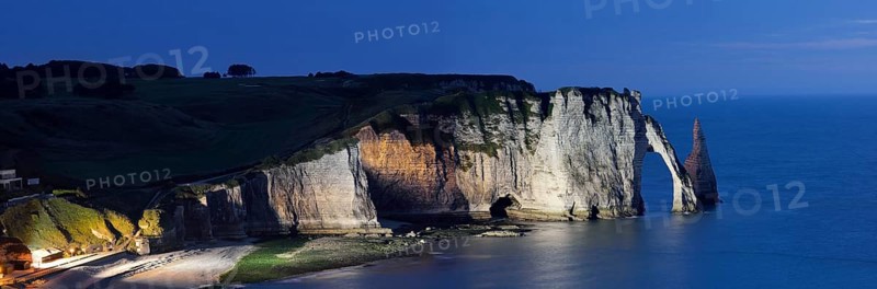 Cliff with the Falaise d'Aval rock gate and the Aiguille d'Etretat rock pin at night, Etretat, Alabaster Coast, Seine-Maritime, Normandy, France